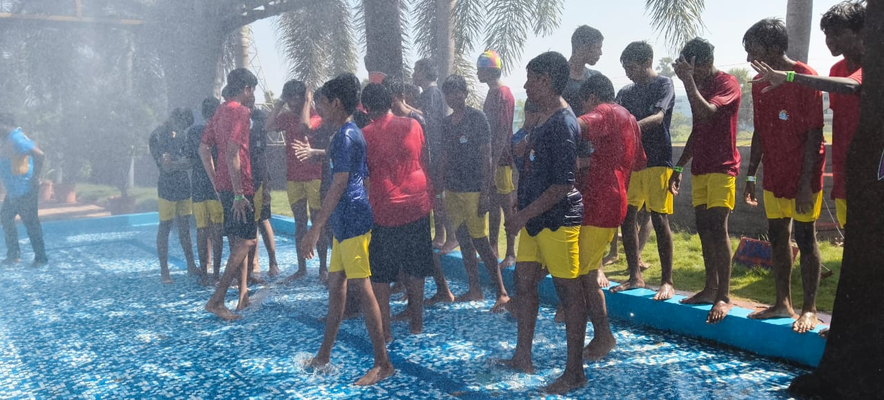 Class 10's Fun in the Waves: A Splashing Good Time
